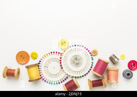 Top view thread with needles buttons. High quality and resolution beautiful photo concept Stock Photo