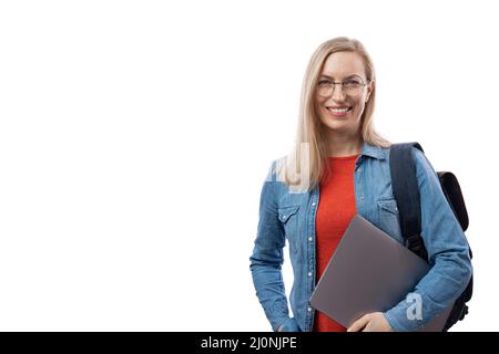 Female student with laptop in studio Stock Photo