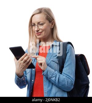 Woman using tablet for studying Stock Photo
