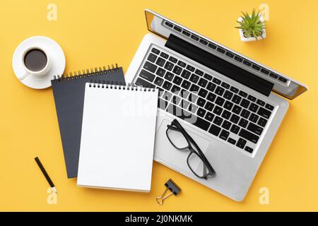 Top view office desk composition with notepad. High quality and resolution beautiful photo concept Stock Photo