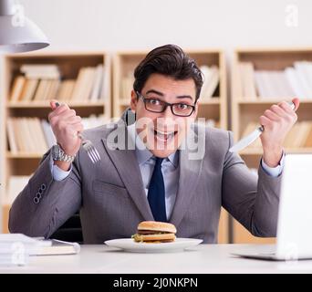 Hungry Funny Businessman Eating Junk Food Sandwich Stock Photo - Alamy