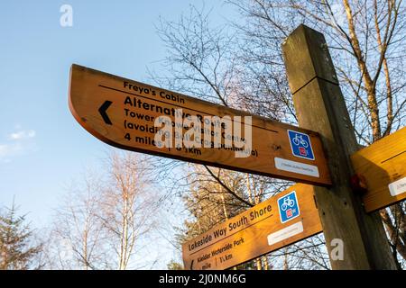 Wooden direction sing posts for hikers on the National cycle trail 10 in Kielder Forest Stock Photo