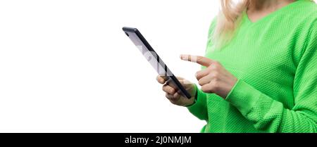 Woman using tablet in studio Stock Photo