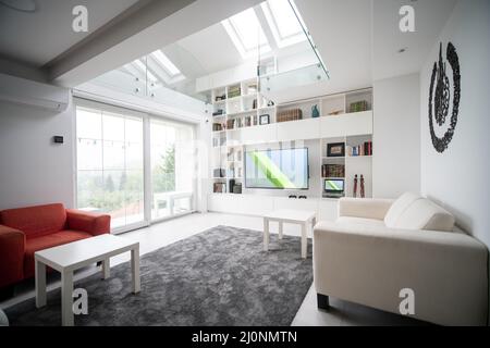 Stylish sofa in modern living room interior Stock Photo