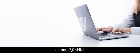 Business woman typing on laptop Stock Photo