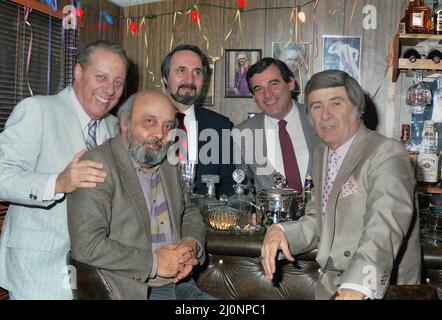 Romanian community in Los Angeles, CA, USA, approx. 1988.  Sitting down, jazz musician Johnny Răducanu and guitarist Nini Pascalini. In the back row, sound engineer Eugen Vasiliu & film director Mihai Iacob. Stock Photo