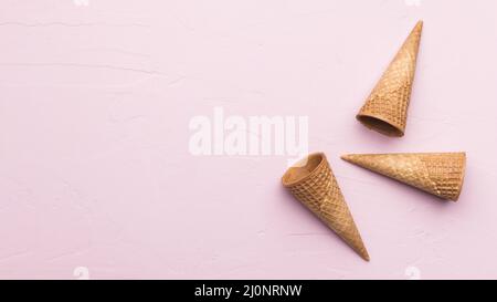 Waffle cones pink texture background. High quality and resolution beautiful photo concept Stock Photo