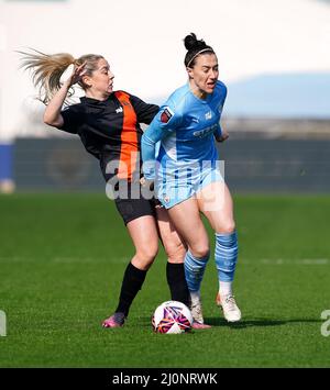 Manchester City's Lucy Bronze (right) and Everton’s Poppy Pattinson battle for the ball during the Vitality Women's FA Cup quarter final match at the Academy Stadium, Manchester. Picture date: Sunday March 20, 2022. Stock Photo