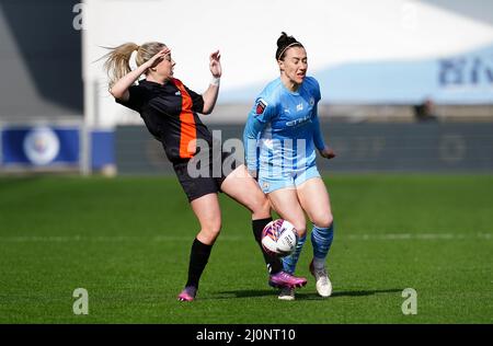 Manchester City's Lucy Bronze (right) and Everton’s Poppy Pattinson battle for the ball during the Vitality Women's FA Cup quarter final match at the Academy Stadium, Manchester. Picture date: Sunday March 20, 2022. Stock Photo