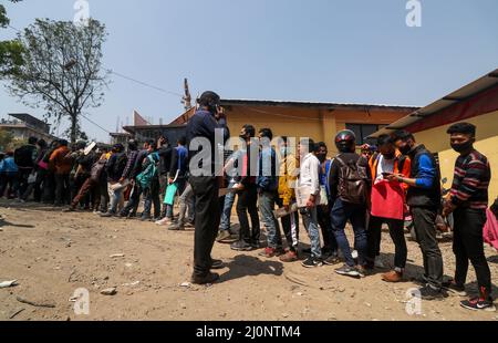 March 20, 2022, Kathmandu, NE, Nepal: Nepalese youth stand in a line to submit application of temporary police (Myadi Police) for upcoming local election in Kathmandu, Nepal on March 20, 2022. (Credit Image: © Aryan Dhimal/ZUMA Press Wire) Stock Photo