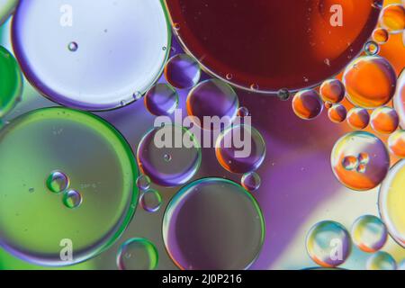 abstract photo of oil drops float on a water Stock Photo