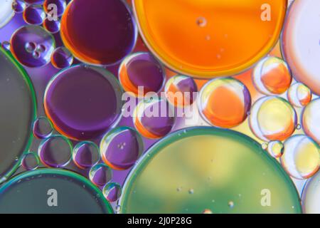 abstract photo of oil drops float on a water Stock Photo
