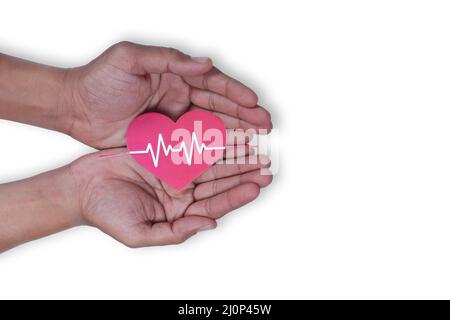 health, medicine, people and cardiology concept - close up of hand with cardiogram on small red paper heart Stock Photo