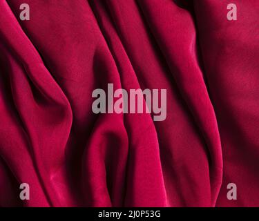 Texture burgundy red crumpled fabric. High quality and resolution beautiful photo concept Stock Photo