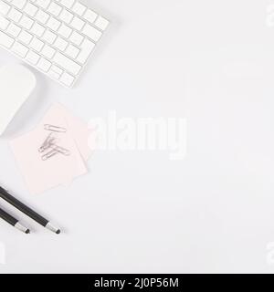Pens sticky notes near keyboard mouse . High quality and resolution beautiful photo concept Stock Photo
