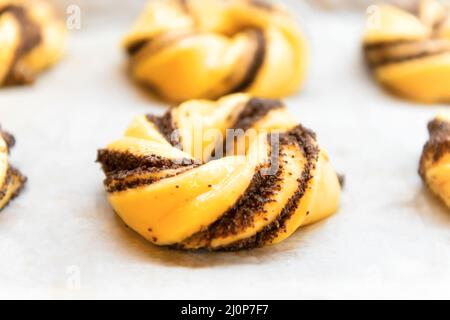 Raw buns rolls in bread bakery Stock Photo