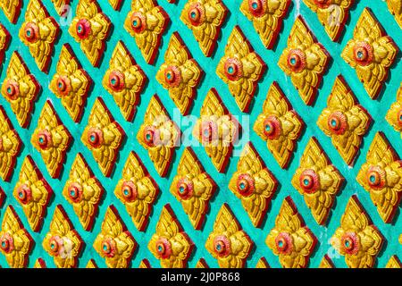 Colorful details Wat Phadung Tham Phothi temple Khao Lak Thailand. Stock Photo