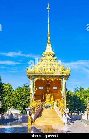 Golden Buddha Wat Phadung Tham Phothi temple Khao Lak Thailand. Stock Photo