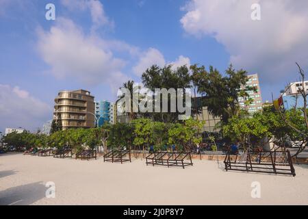 Sunny Day View on the Maldivian Beach Promenade in the Male City Stock Photo