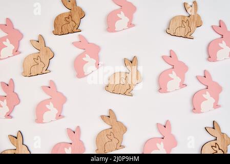 Pattern with wooden rabbit on white background, Happy Easter card Stock Photo