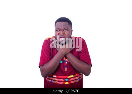 handsome young man wearing loincloth shirt standing on white background feeling throat pain holding neck by hand. Stock Photo