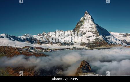 View of the Matterhorn above the clouds Stock Photo