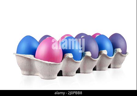 Easter multi-colored eggs ten pieces in a box on a isolated on white background. Stock Photo