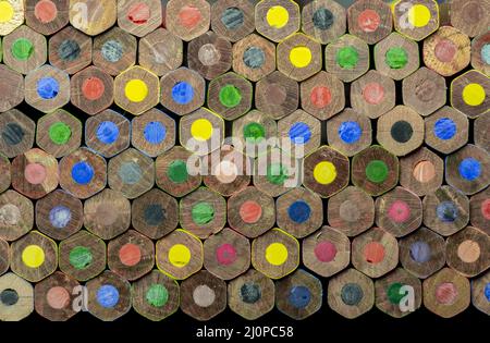 End view of wooden colored pencils. Colorful Pencils End. Macro. Close up. Abstract. Background. Texture. Stock Photo