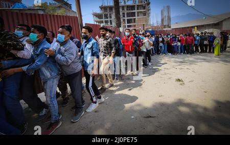 March 20, 2022, Kathmandu, Bagmati, Nepal: Nepali  youths queue up to file the application forms for enrollment in ''Myadi Prahari'', the temporary security force for upcoming local elections in Kathmandu, Nepal on March 20, 2022. Nepal Government calls application of 100,000 scheduled to hold local level election on May 14 for the first time in 19 years. (Credit Image: ©  Sunil Sharma/ZUMA Press Wire) Stock Photo