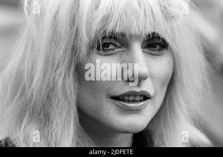 Debbie Harry pictured in London promoting her film Videodrome.  At this point, Blondie were not active as a band since the early 1982.  Though they did release new material in 1999.  Deborah Ann Harry (born Angela Trimble -  July 1, 1945) is an American singer, songwriter and actress, known as the lead vocalist of the band Blondie. Her recordings with the band reached No.?1 in the US and UK charts on many occasions from 1979 to 2017.  Blondie hits include Denis, Call Me, Hanging On The Telephone, Heart of Glass, Sunday Girl, Rapture and Atomic amongst many others.  Picture taken 21st November Stock Photo