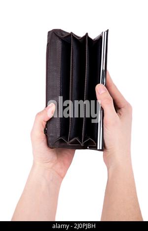 A man holds an empty open wallet in his hands on a white background close-up Stock Photo
