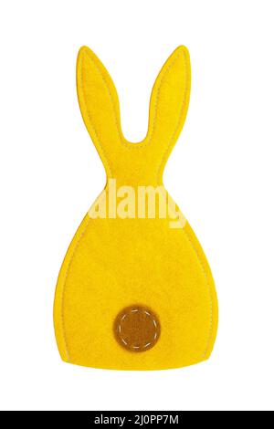 Yellow felt stitched rabbit on white isolated background. Easter, symbol of year Stock Photo