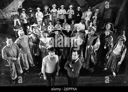 The cast of Aladdin with director Peter Roberts (centre, right) and choreogreapher Ray Cornell. December 1983. Stock Photo