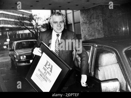 Mr John Egan, chairman of Jaguar Cars, leaves Birmingham Chamber of Industry and Commerce after being presented with the 1983 PA Management awards for individual achievement. 1st February 1984. Stock Photo