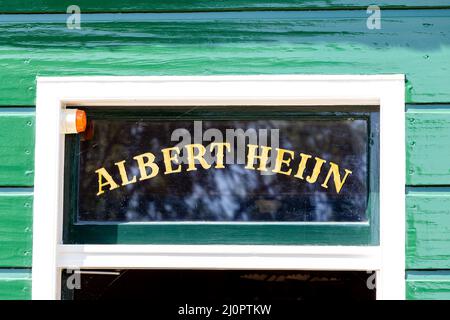 Old Albert Heijn supermarket sign on window in Zaanse Schans in Zaanstad North Holland The Netherlands Stock Photo