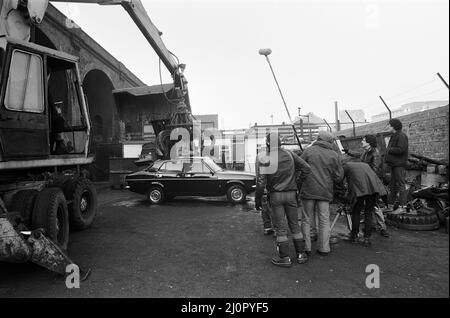 UB40 filming a video film in a scrapyard. The video film will feature songs from their album 'Labour of Love'.21st January 1983. Stock Photo