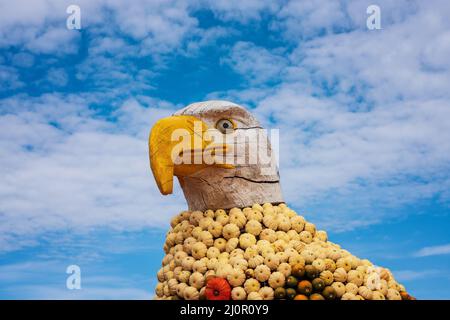 White-tailed eagle figure decorated with pumpkins Stock Photo