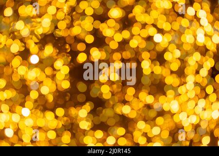 Festive golden bokeh Stock Photo