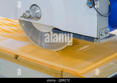 Automatic cnc bridge saw - router profiling system cutting artificial stone Stock Photo