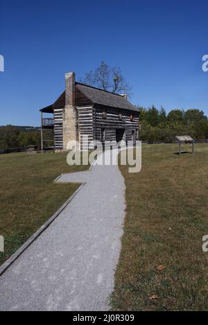 Curved walkway leads to the Jacob Wolf House Historic Site and Territorial Courthouse.  House is in the town of Norfork, Arkansas. Stock Photo