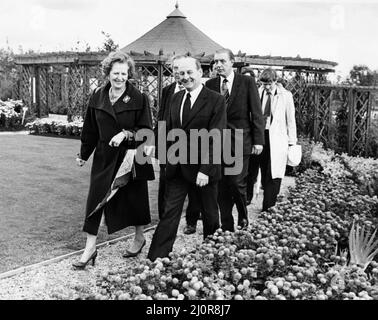 British Prime Minister Margaret Thatcher is led by Sir Leslie Young through the Victorian Garden at the International Garden Festival which was held in Liverpool from May to October 1984. Picture taken 3rd October 1984. Stock Photo