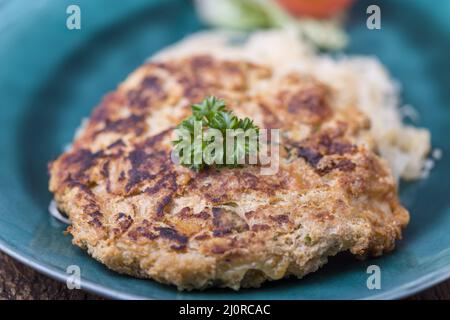 Austrian cheese dumpling with sauerkraut Stock Photo