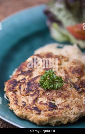 Austrian cheese dumpling with sauerkraut Stock Photo
