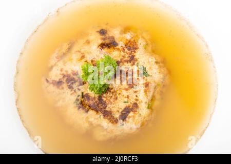 Austrian cheese dumpling in broth Stock Photo
