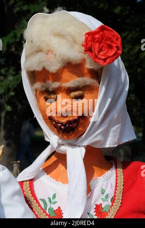 Closeup of a woman statue with clothes in the street Stock Photo