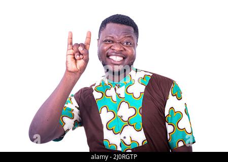 handsome happy young man gesturing fingers and smiling at camera. Stock Photo