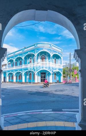 Phuket old town on a sunny morning with colorful buildings Street in the Portugese style Romani in Phuket Town. Also called Chin Stock Photo