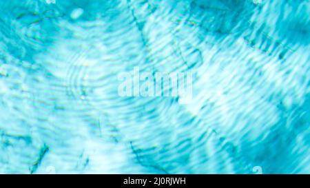 Water swimming pool texture and surface water on pool, reflection blue wave nature water on the outdoor swimming pool Stock Photo