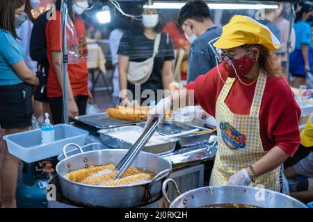 Pattaya Thailand, Naklua night market with lots of street food, local Thai market with people selling food Naklua Night Market Stock Photo