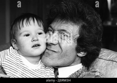 Lionel Blair pictured at home with his son. 19th October 1983. Stock Photo